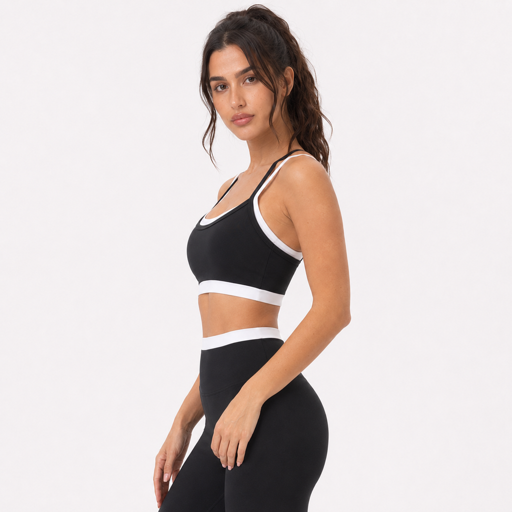 Senior black__04_front-detail | Close-up front view of the layered sports bra in black
