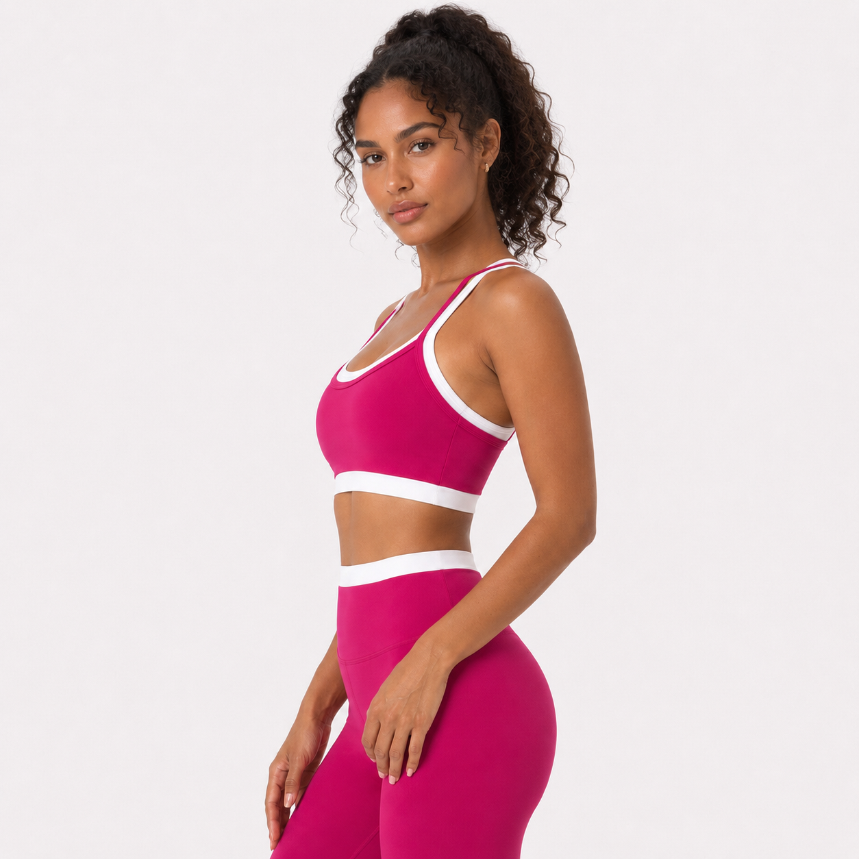 Pitaya color__04_front-detail | Close-up front view of the layered sports bra in Pitaya
