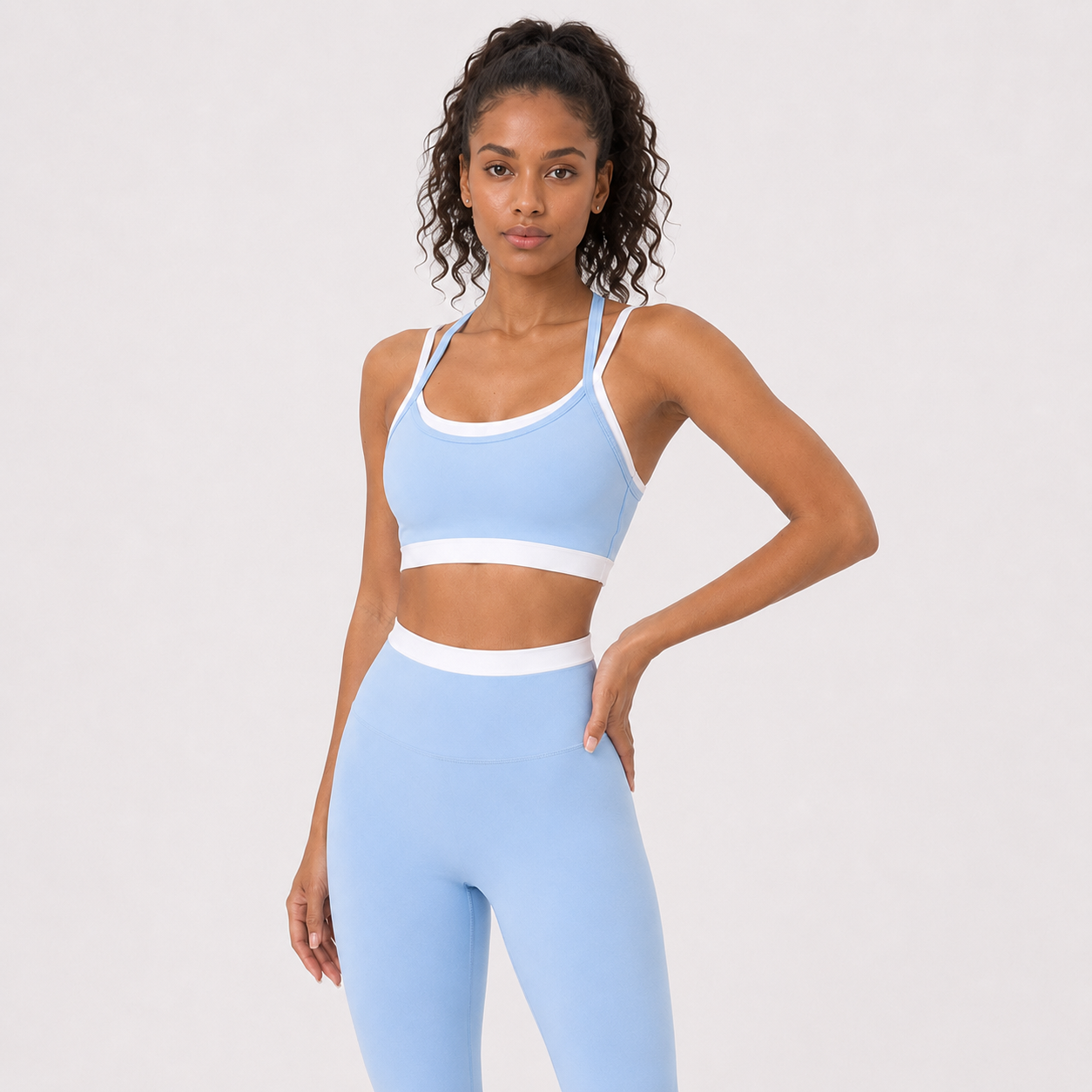 Sky Blue__04_front-detail | Close-up front view of the layered sports bra in Sky Blue